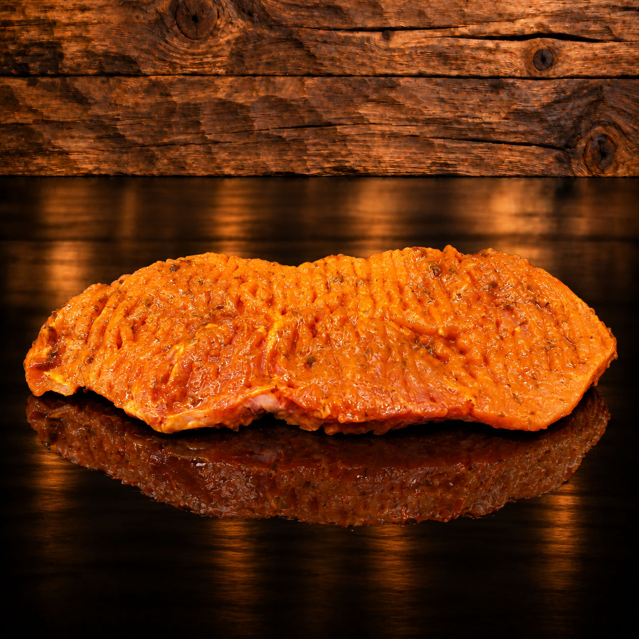 Cognac Steak Schwein Vac. auf Holzschneidebrett